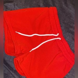 red shorts